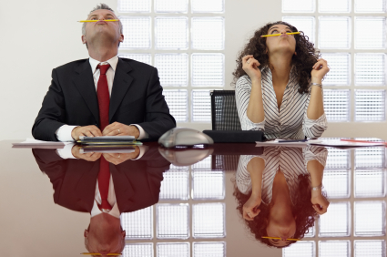 Staff balancing pencils on their lips